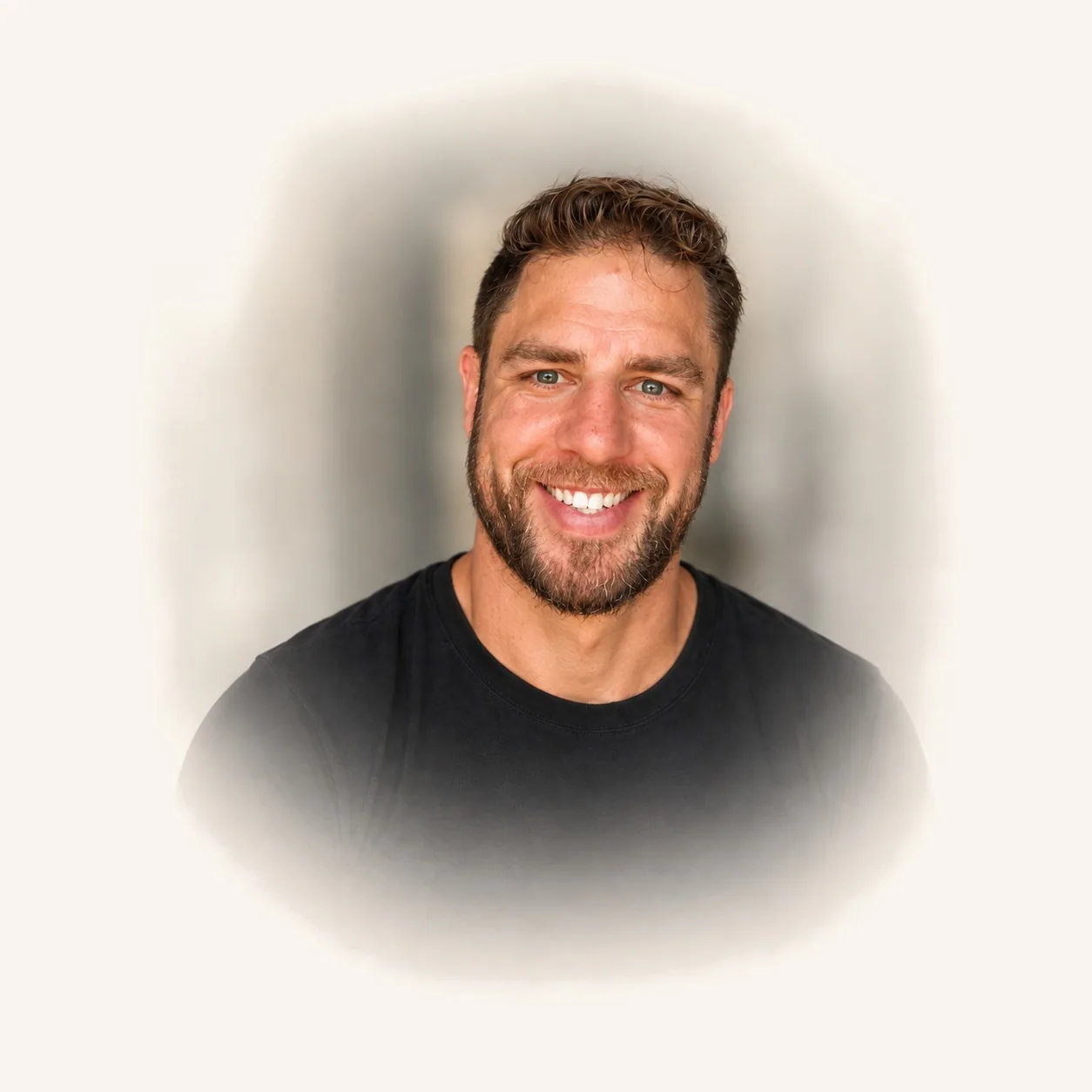 Mike James, founder of CRAVE, smiling in a black t-shirt